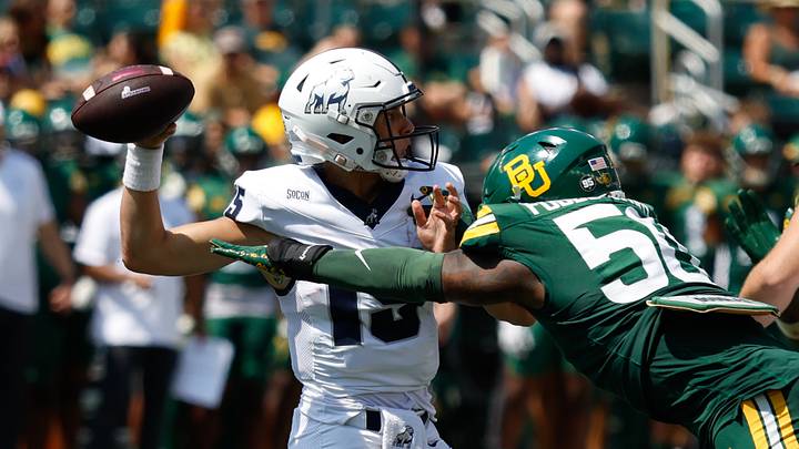 Sep 13, 2025; Waco, Texas, USA; Baylor Bears linebacker Matthew Fobbs-White (50) applies pressure to Samford Bulldogs quarterback Brady Stober (15) during the second half at McLane Stadium. Mandatory Credit: Chris Jones-Imagn Images Sep 13, 2025; Waco, Texas, USA; Baylor Bears linebacker Matthew Fobbs-White (50) applies pressure to Samford Bulldogs quarterback Brady Stober (15) during the second half at McLane Stadium. Mandatory Credit: Chris Jones-Imagn Images