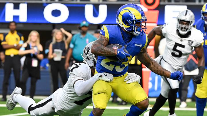 Oct 20, 2024; Inglewood, California, USA; Los Angeles Rams running back Kyren Williams (23) tries to break a tackle by Las Vegas Raiders cornerback Jakorian Bennett (0) during the fourth quarter at SoFi Stadium. Mandatory Credit: Robert Hanashiro-Imagn Images Oct 20, 2024; Inglewood, California, USA; Los Angeles Rams running back Kyren Williams (23) tries to break a tackle by Las Vegas Raiders cornerback Jakorian Bennett (0) during the fourth quarter at SoFi Stadium. Mandatory Credit: Robert Hanashiro-Imagn Images