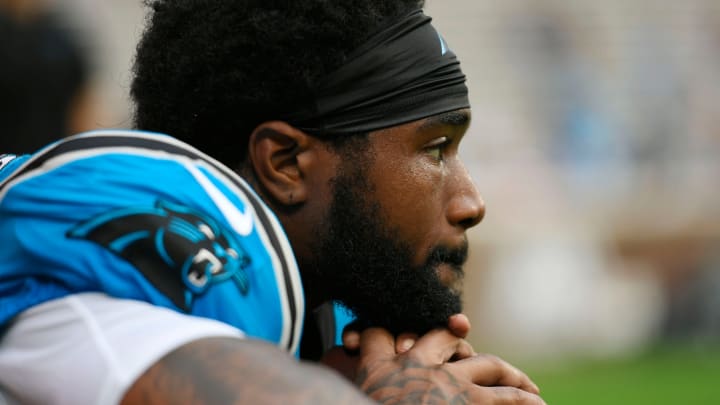 Carolina Panther Miles Sanders (6) takes a moment during warm-ups at Memorial Stadium the Panthers Fan Fest in Clemson, S.C., on Thursday, Aug. 1, 2024.