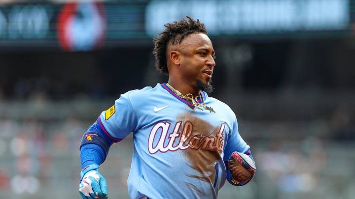 Jun 6, 2026; Cumberland, Georgia, USA; Atlanta Braves second baseman Ozzie Albies (1) steals third base against the Pittsburgh Pirates during the third inning at Truist Park. Mandatory Credit: Jordan Godfree-Imagn Images