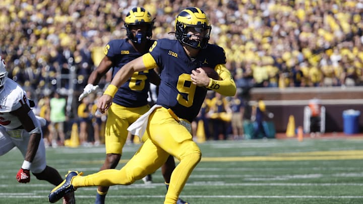 Sep 23, 2023; Ann Arbor, Michigan, USA;  Michigan Wolverines quarterback J.J. McCarthy (9) runs the