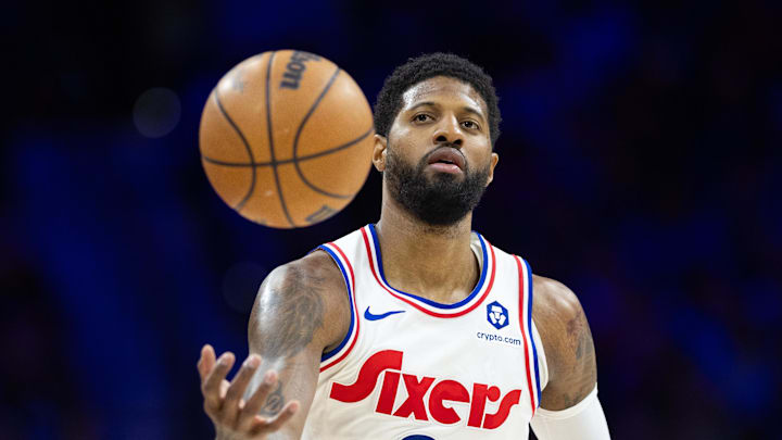 Mar 1, 2025; Philadelphia, Pennsylvania, USA; Philadelphia 76ers forward Paul George (8) catches a ball against the Golden State Warriors during the third quarter at Wells Fargo Center. Mandatory Credit: Bill Streicher-Imagn Images
