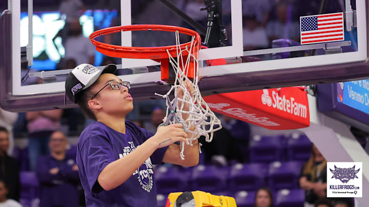 Olivia Miles cuts down the net after TCU women's basketball claims the Big 12 title outright. Olivia Miles cuts down the net after TCU women's basketball claims the Big 12 title outright.