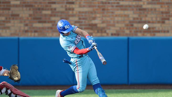Kansas baseball player Tyson LeBlanc (2) hits the ball against Arkansas during the NCAA regional tournament at Hoglund Ballpark in Lawrence, Kansas, on May 31, 2026. Kansas baseball player Tyson LeBlanc (2) hits the ball against Arkansas during the NCAA regional tournament at Hoglund Ballpark in Lawrence, Kansas, on May 31, 2026.