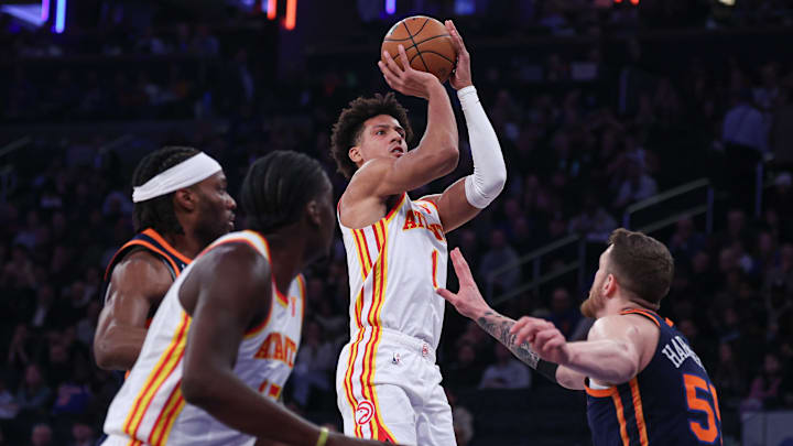 Mar 5, 2024; New York, New York, USA; Atlanta Hawks forward Jalen Johnson (1) shoots the ball as New York Knicks center Isaiah Hartenstein (55) defends during the first quarter at Madison Square Garden. Mandatory Credit: Vincent Carchietta-Imagn Images