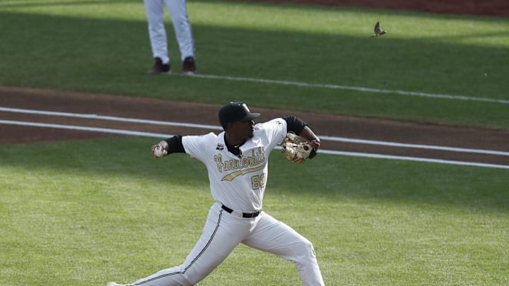 Jun 30, 2021; Omaha, Nebraska, USA; Vanderbilt Commodores pitcher Kumar Rocker (80) throws a pitch against the Mississippi State Bulldogs in the first inning at TD Ameritrade Park. Mandatory Credit: Bruce Thorson-Imagn Images Jun 30, 2021; Omaha, Nebraska, USA; Vanderbilt Commodores pitcher Kumar Rocker (80) throws a pitch against the Mississippi State Bulldogs in the first inning at TD Ameritrade Park. Mandatory Credit: Bruce Thorson-Imagn Images