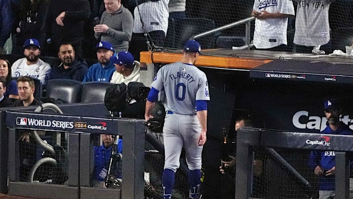 Oct 30, 2024; New York, New York, USA; Los Angeles Dodgers pitcher Jack Flaherty (0) walks to the dug out after being relieved during the second inning against the New York Yankees in game four of the 2024 MLB World Series at Yankee Stadium. Mandatory Credit: Robert Deutsch-Imagn Images