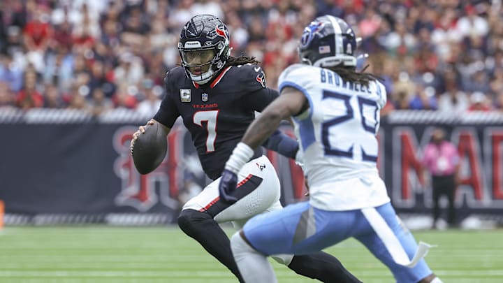 Nov 24, 2024; Houston, Texas, USA; Houston Texans quarterback C.J. Stroud (7) runs with the ball during the second quarter against the Tennessee Titans at NRG Stadium. Mandatory Credit: Troy Taormina-Imagn Images