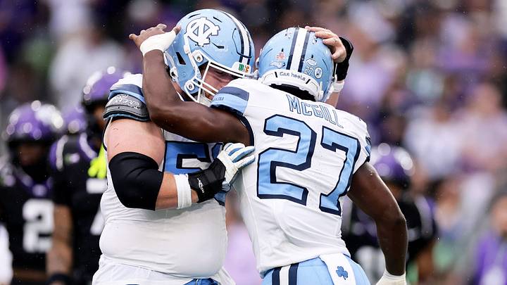 Aug 29, 2026; Dublin, Co. Dublin, IRL; North Carolina Tar Heels running back Jaylen McGill (27) celebrates with North Carolina Tar Heels defensive lineman Viliami Moala (56) after scoring a touchdown against the TCU Horned Frogs in the first half at Aviva Stadium. Mandatory Credit: Laszlo Geczo-Imagn Images Aug 29, 2026; Dublin, Co. Dublin, IRL; North Carolina Tar Heels running back Jaylen McGill (27) celebrates with North Carolina Tar Heels defensive lineman Viliami Moala (56) after scoring a touchdown against the TCU Horned Frogs in the first half at Aviva Stadium. Mandatory Credit: Laszlo Geczo-Imagn Images