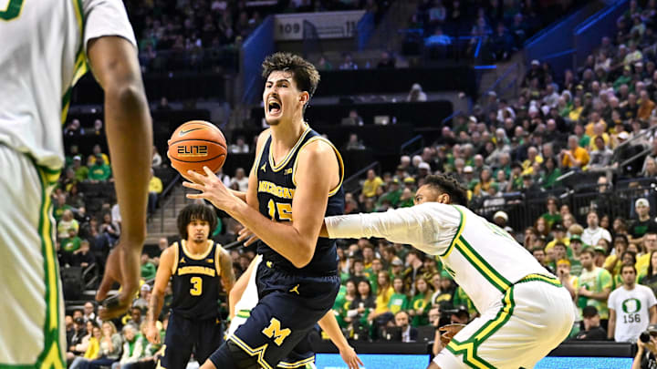 Jan 17, 2026; Eugene, Oregon, USA; Michigan Wolverines center Aday Mara (15) drives to the basket during the second half against the Oregon Ducks at Matthew Knight Arena. Mandatory Credit: Craig Strobeck-Imagn Images