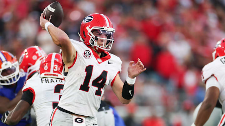 Nov 1, 2025; Jacksonville, Florida, USA; Georgia Bulldogs quarterback Gunner Stockton (14) looks to pass in the second half against the Florida Gators at EverBank Stadium. Mandatory Credit: Matt Pendleton-Imagn Images