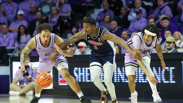 Feb 11, 2025; Manhattan, Kansas, USA; Arizona Wildcats guard Jaden Bradley (0), Kansas State Wildcats guard Dug McDaniel (0) and guard Max Jones (2) go after a loose ball during the second half at Bramlage Coliseum. Mandatory Credit: Scott Sewell-Imagn Images