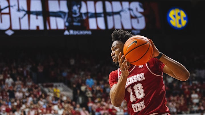 Feb 15, 2025; Tuscaloosa, Alabama, USA; Alabama Crimson Tide forward Mouhamed Dioubate (10) controls the ball against the Auburn Tigers during the first half at Coleman Coliseum. 