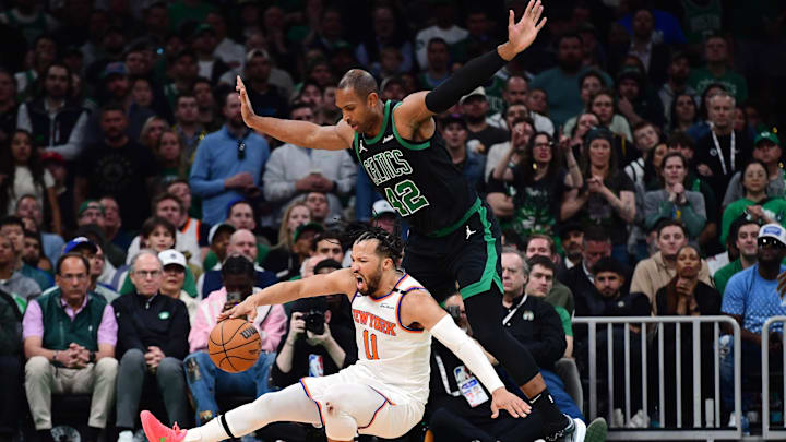 May 14, 2025; Boston, Massachusetts, USA; Boston Celtics center Al Horford (42) is called for a foul on New York Knicks guard Jalen Brunson (11) in the second half during game five of the second round for the 2025 NBA Playoffs at TD Garden. Mandatory Credit: Bob DeChiara-Imagn Images