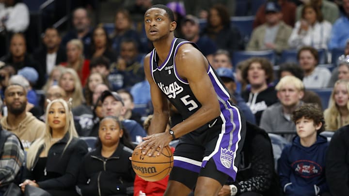 Dec 31, 2023; Memphis, Tennessee, USA; Sacramento Kings guard De'Aaron Fox (5) shoots for three during the first half against the Memphis Grizzlies at FedExForum. Mandatory Credit: Petre Thomas-Imagn Images