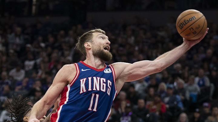 December 1, 2024; Sacramento, California, USA; Sacramento Kings forward Domantas Sabonis (11) grabs a rebound against the San Antonio Spurs during the second quarter at Golden 1 Center. Mandatory Credit: Kyle Terada-Imagn Images December 1, 2024; Sacramento, California, USA; Sacramento Kings forward Domantas Sabonis (11) grabs a rebound against the San Antonio Spurs during the second quarter at Golden 1 Center. Mandatory Credit: Kyle Terada-Imagn Images