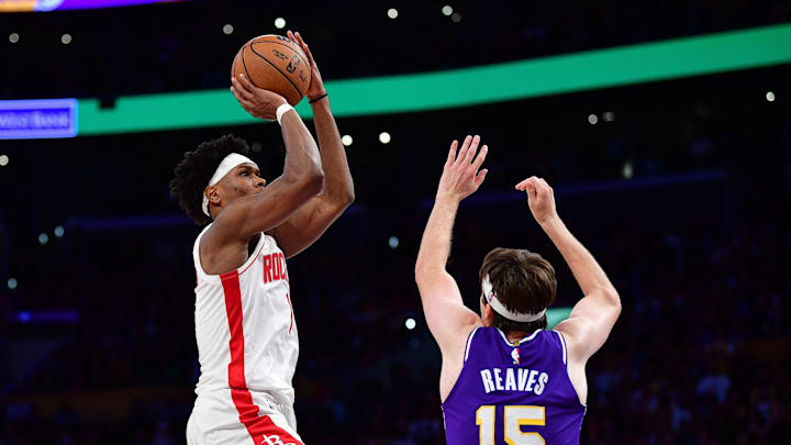 Apr 29, 2026; Los Angeles, California, USA; Houston Rockets guard Amen Thompson (1) shoots against Los Angeles Lakers guard Austin Reaves (15) during the second half in game five of the first round of the 2026 NBA Playoffs at Crypto.com Arena. Mandatory Credit: Gary A. Vasquez-Imagn Images