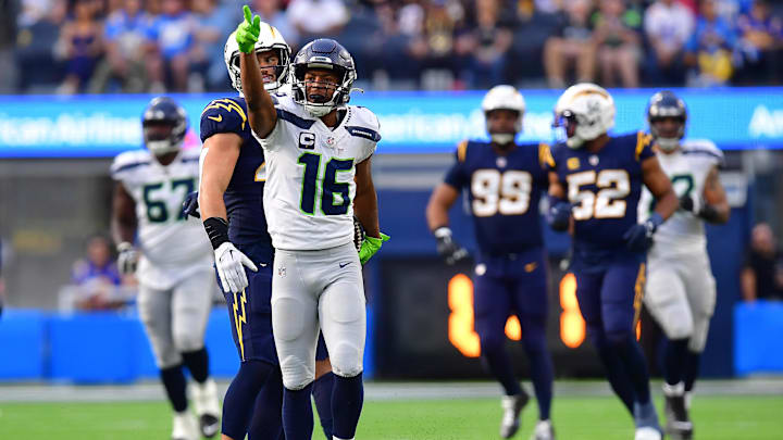 Oct 23, 2022; Inglewood, California, USA;Seattle Seahawks wide receiver Tyler Lockett (16) reacts after a reception against the Los Angeles Chargers during the second half at SoFi Stadium. Mandatory Credit: Gary A. Vasquez-Imagn Images