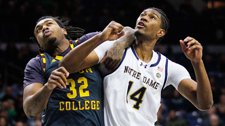 Boston College forward Chad Venning (32) and Notre Dame forward Kebba Njie (14) get tangled up during a free throw during a NCAA men's basketball game between Notre Dame and Boston College at Purcell Pavilion on Monday, Jan. 13, 2025, in South Bend. Boston College forward Chad Venning (32) and Notre Dame forward Kebba Njie (14) get tangled up during a free throw during a NCAA men's basketball game between Notre Dame and Boston College at Purcell Pavilion on Monday, Jan. 13, 2025, in South Bend.