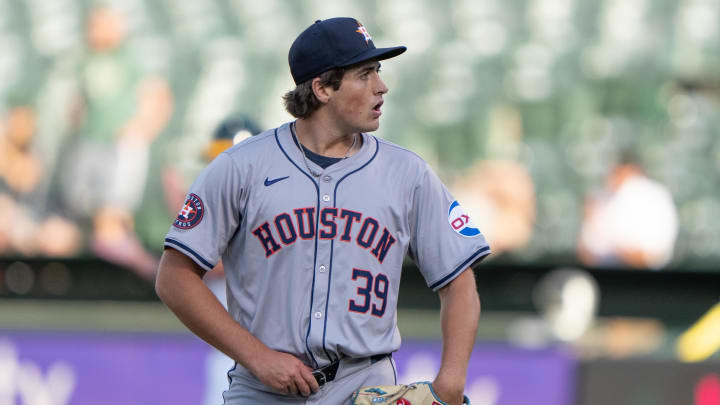 Jul 23, 2024; Oakland, California, USA; Houston Astros pitcher Jake Bloss (39) reacts after giving up two runs during the first inning against the Oakland Athletics at Oakland-Alameda County Coliseum. Jul 23, 2024; Oakland, California, USA; Houston Astros pitcher Jake Bloss (39) reacts after giving up two runs during the first inning against the Oakland Athletics at Oakland-Alameda County Coliseum.
