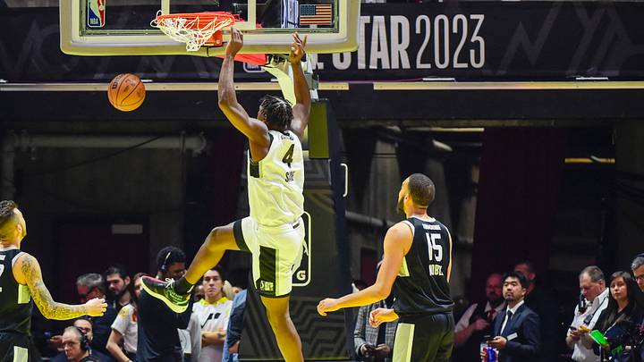Feb 19, 2023; Salt Lake City, UT, USA; Team Scoot forward Babacar Sane (4) makes a slam dunk over Team Luka small forward Isaiah Mobley (15) during the first half at the Jon M. Huntsman Center. Mandatory Credit: Christopher Creveling-USA TODAY Sports Feb 19, 2023; Salt Lake City, UT, USA; Team Scoot forward Babacar Sane (4) makes a slam dunk over Team Luka small forward Isaiah Mobley (15) during the first half at the Jon M. Huntsman Center. Mandatory Credit: Christopher Creveling-USA TODAY Sports