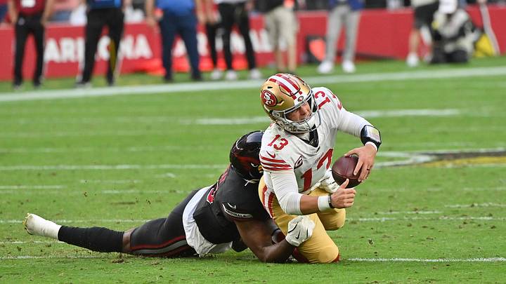 San Francisco 49ers quarterback Brock Purdy and Arizona Cardinals outside linebacker Josh Sweat.