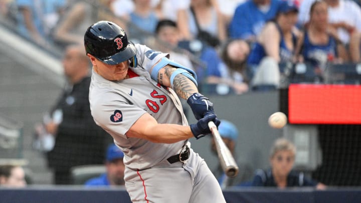 Boston Red Sox designated hitter Tyler O'Neill (17) hits a solo home run against the Toronto Blue Jays in the third inning at Rogers Centre on June 17. Boston Red Sox designated hitter Tyler O'Neill (17) hits a solo home run against the Toronto Blue Jays in the third inning at Rogers Centre on June 17.