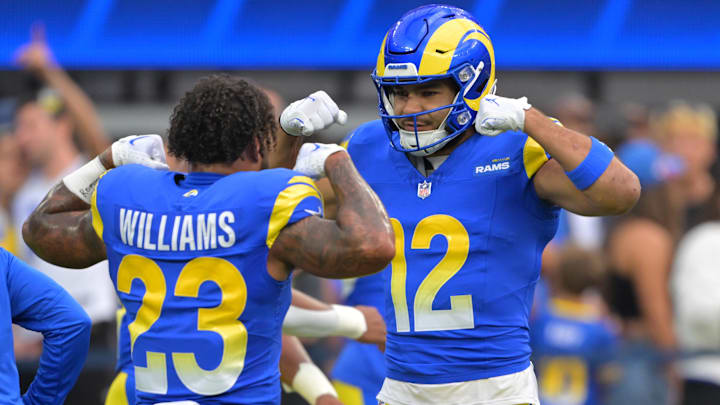 Sep 28, 2025; Inglewood, California, USA; Los Angeles Rams running back Kyren Williams (23) and wide receiver Puka Nacua (12) flex as they get ready for the game against the Indianapolis Colts at SoFi Stadium. Mandatory Credit: Jayne Kamin-Oncea-Imagn Images Sep 28, 2025; Inglewood, California, USA; Los Angeles Rams running back Kyren Williams (23) and wide receiver Puka Nacua (12) flex as they get ready for the game against the Indianapolis Colts at SoFi Stadium. Mandatory Credit: Jayne Kamin-Oncea-Imagn Images