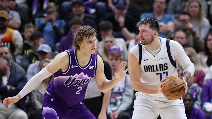 Mar 25, 2024; Salt Lake City, Utah, USA; Dallas Mavericks guard Luka Doncic (77) looks to pass the