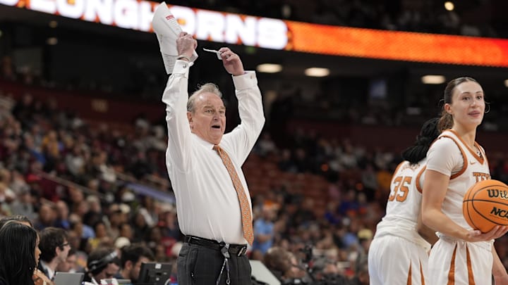 Mar 7, 2025; Greenville, SC, USA; Texas Longhorns head coach Vic Schaefer reacts to a call by officials against the Ole Miss Rebels during the second half at Bon Secours Wellness Arena. Mandatory Credit: Jim Dedmon-Imagn Images Mar 7, 2025; Greenville, SC, USA; Texas Longhorns head coach Vic Schaefer reacts to a call by officials against the Ole Miss Rebels during the second half at Bon Secours Wellness Arena. Mandatory Credit: Jim Dedmon-Imagn Images