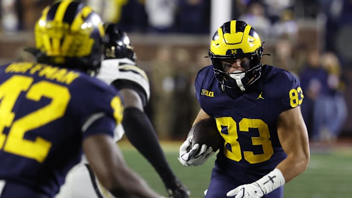 Nov 1, 2025; Ann Arbor, Michigan, USA;  Michigan Wolverines tight end Zack Marshall (83) runs the ball in the second half against the Purdue Boilermakers at Michigan Stadium. Mandatory Credit: Rick Osentoski-Imagn Images