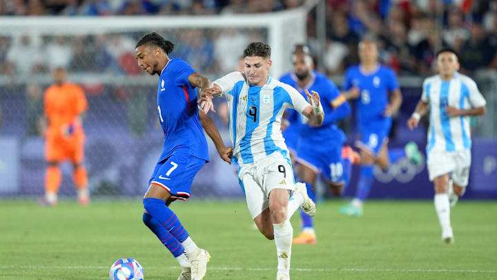 France v Argentina: Men's Football Quarterfinal - Olympic Games Paris 2024: Day 7 - Olise battling with Julian Alvarez 