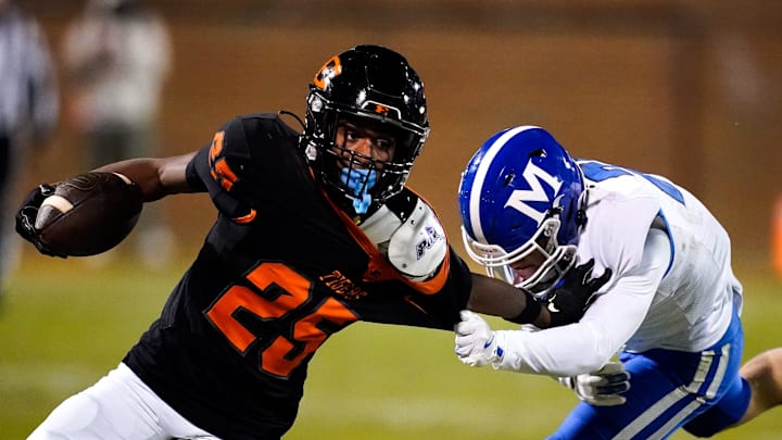 Ensworth's Justin Hopkins (25) tries to escape from McCallie's Joseph Korenblit (21) during the third quarter at Ensworth High School in Nashville, Tenn., Friday, Nov. 22, 2024. Ensworth's Justin Hopkins (25) tries to escape from McCallie's Joseph Korenblit (21) during the third quarter at Ensworth High School in Nashville, Tenn., Friday, Nov. 22, 2024.