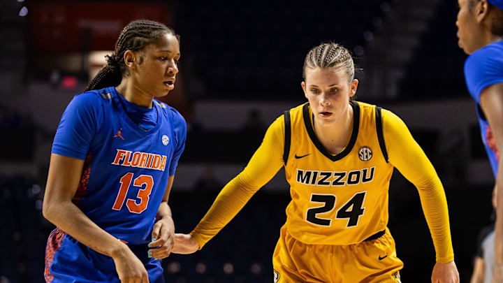 Missouri Tigers guard Ashton Judd (24) guards Florida Gators guard Laila Reynolds (13) during the second half at Billy Donovan Court at Exactech Arena in Gainesville, FL on Thursday, February 22, 2024. [Matt Pendleton/Gainesville Sun]