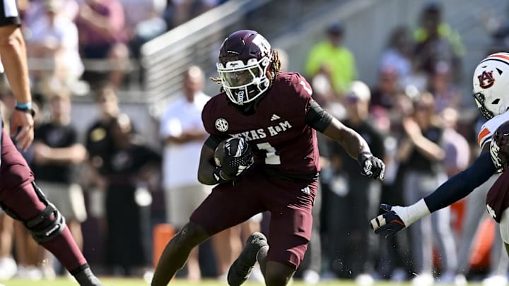 Sep 27, 2025; College Station, Texas, USA; Texas A&M Aggies wide receiver Mario Craver (1) runs the ball during the first half against the Auburn Tigers at Kyle Field. Mandatory Credit: Maria Lysaker-Imagn Images 