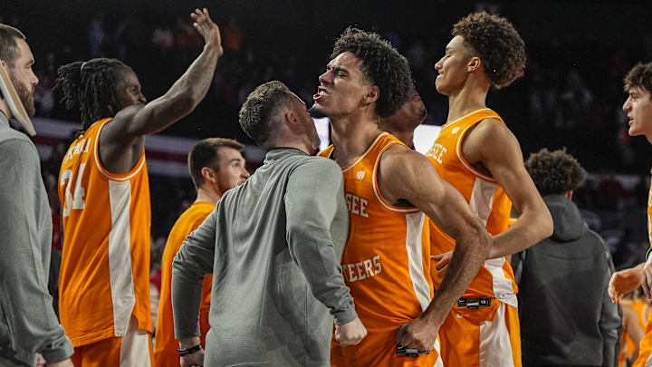 Jan 28, 2026; Athens, Georgia, USA; Tennessee Volunteers guard Bishop Boswell (3) reacts with staff members after defeating the Georgia Bulldogs in overtime at Stegeman Coliseum. Mandatory Credit: Dale Zanine-Imagn Images