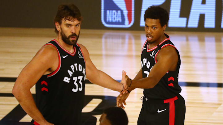 Sep 5, 2020; Lake Buena Vista, Florida, USA; Toronto Raptors center Marc Gasol (33) celebrates with guard Kyle Lowry (7) during the first half of game four in the second round of the 2020 NBA Playoffs against the Boston Celtics at ESPN Wide World of Sports Complex. Mandatory Credit: Kim Klement-Imagn Images Sep 5, 2020; Lake Buena Vista, Florida, USA; Toronto Raptors center Marc Gasol (33) celebrates with guard Kyle Lowry (7) during the first half of game four in the second round of the 2020 NBA Playoffs against the Boston Celtics at ESPN Wide World of Sports Complex. Mandatory Credit: Kim Klement-Imagn Images