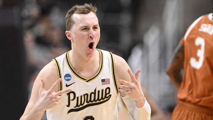 Purdue Boilermakers guard Fletcher Loyer (2) celebrates after making a three-point basket against the Texas Longhorns. Purdue Boilermakers guard Fletcher Loyer (2) celebrates after making a three-point basket against the Texas Longhorns.