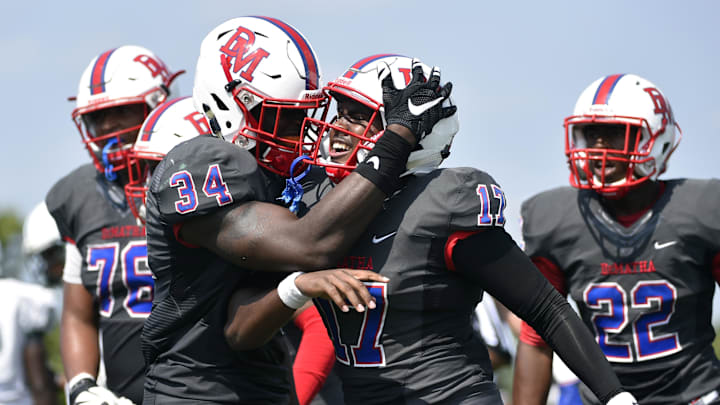 DeMatha Stags quarterback celebrates after a touchdown