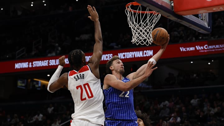 Nov 1, 2025; Washington, District of Columbia, USA; Orlando Magic forward Franz Wagner (22) shoots the ball as Washington Wizards center Alex Sarr (20) defends in the first half at Capital One Arena. Mandatory Credit: Geoff Burke-Imagn Images