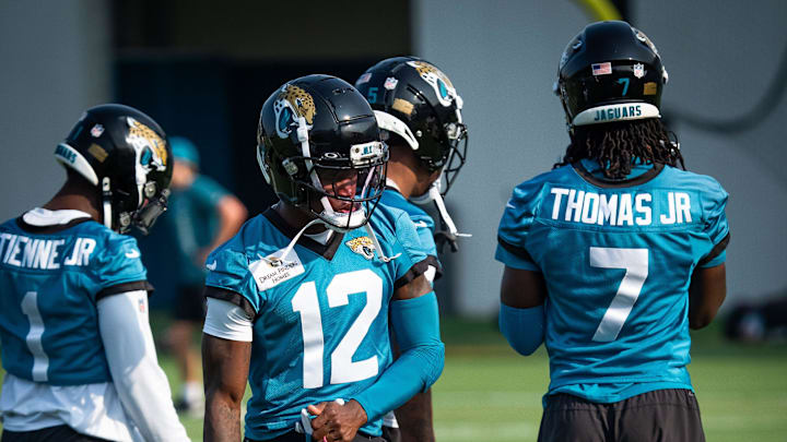 Jacksonville Jaguars wide receiver Travis Hunter (12) dances during warmups during the seventh organized team activity at the Miller Electric Center in Jacksonville, Fla. Monday, June 2, 2025. [Doug Engle/Florida Times-Union]