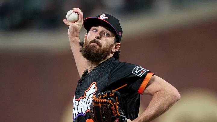 San Francisco, California, USA; San Francisco Giants pitcher Ryan Walker (74) throws a pitch against the Kansas City Royals during the ninth inning at Oracle Park. Mandatory Credit: Robert Edwards-Imagn Images