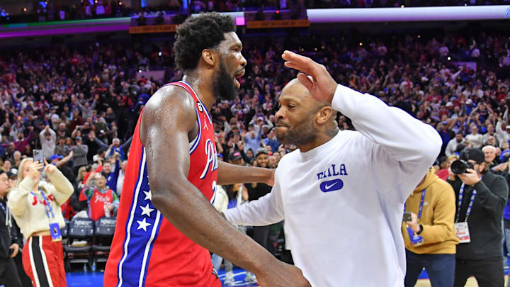 Mar 10, 2023; Philadelphia, Pennsylvania, USA; Philadelphia 76ers center Joel Embiid (21) celebrates win with forward P.J. Tucker (17) against the Portland Trail Blazers at Wells Fargo Center. Mandatory Credit: Eric Hartline-Imagn Images