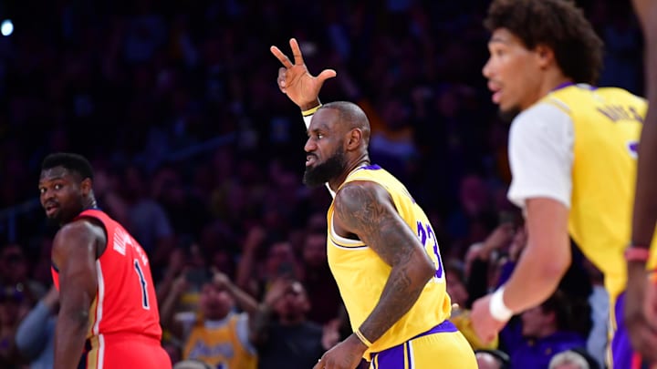 Mar 4, 2025; Los Angeles, California, USA;  Los Angeles Lakers forward LeBron James (23) reacts after scoring a three point basket and recording 50,000 career NBA points against the against the New Orleans Pelicans during the first half at Crypto.com Arena. Mandatory Credit: Gary A. Vasquez-Imagn Images