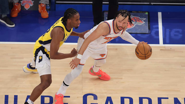May 29, 2025; New York, New York, USA; New York Knicks guard Jalen Brunson (11) controls the ball against Indiana Pacers forward Aaron Nesmith (23) in the third quarter during game five of the eastern conference finals for the 2025 NBA Playoffs at Madison Square Garden. Mandatory Credit: Brad Penner-Imagn Images