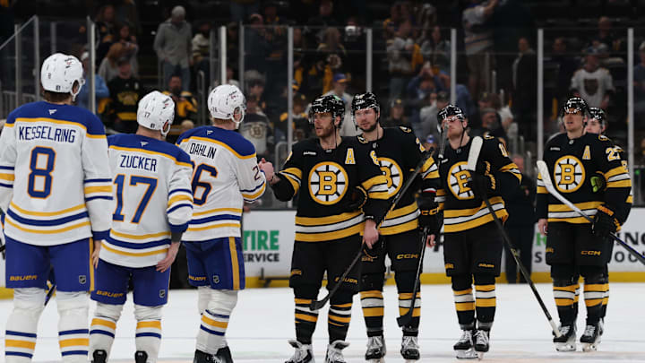 May 1, 2026; Boston, Massachusetts, USA; Boston Bruins right wing David Pastrnak (88) leads the Bruins through the Bruins as he shakes hands with Buffalo Sabres defenseman Rasmus Dahlin (26) after game six of the first round of the 2026 Stanley Cup Playoffs at TD Garden. Mandatory Credit: Winslow Townson-Imagn Images