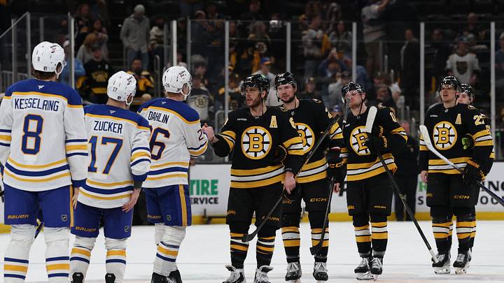 May 1, 2026; Boston, Massachusetts, USA; Boston Bruins right wing David Pastrnak (88) leads the Bruins through the Bruins as he shakes hands with Buffalo Sabres defenseman Rasmus Dahlin (26) after game six of the first round of the 2026 Stanley Cup Playoffs at TD Garden. Mandatory Credit: Winslow Townson-Imagn Images