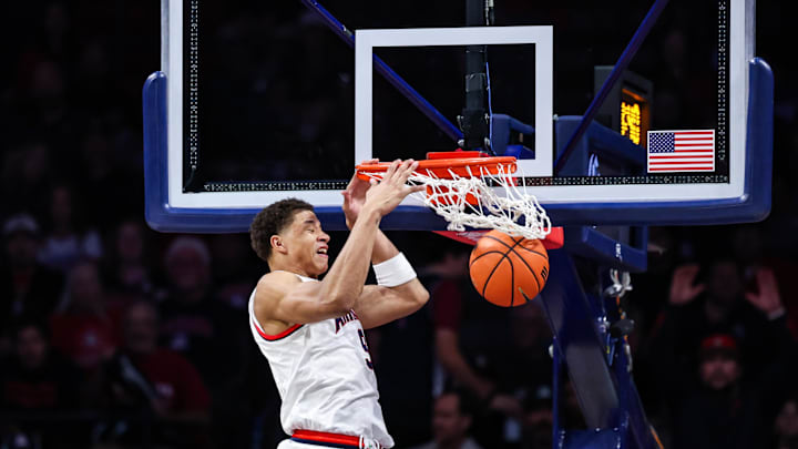 Dec 30, 2024; Tucson, Arizona, USA;  Arizona Wildcats forward Carter Bryant (9) dunks the ball during the first half of the game against the TCU Horned Frogs at McKale Center. Mandatory Credit: Aryanna Frank-Imagn Images