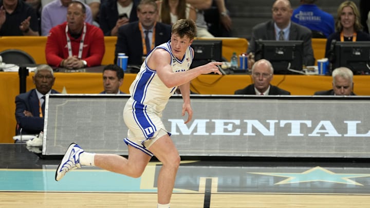 Apr 5, 2025; San Antonio, TX, USA; Duke Blue Devils guard Kon Knueppel (7) reacts after a play against the Houston Cougars during the first half in the semifinals of the men's Final Four of the 2025 NCAA Tournament at Alamodome. Mandatory Credit: Scott Wachter-Imagn Images
