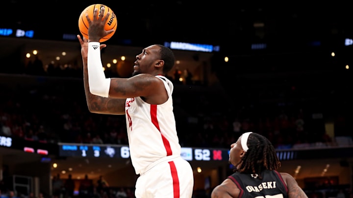 Mar 22, 2024; Memphis, TN, USA;  Nebraska Cornhuskers forward Juwan Gary (4) shoots the ball against Texas A&M Aggies guard Manny Obaseki (35) in the first round of the 2024 NCAA Tournament at FedExForum. Mandatory Credit: Petre Thomas-Imagn Images